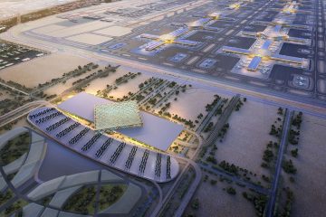Dubai Al Maktoum Havaalanı’nda (DWC) modern terminal binası ve apron bölgesinde park etmiş uçaklar